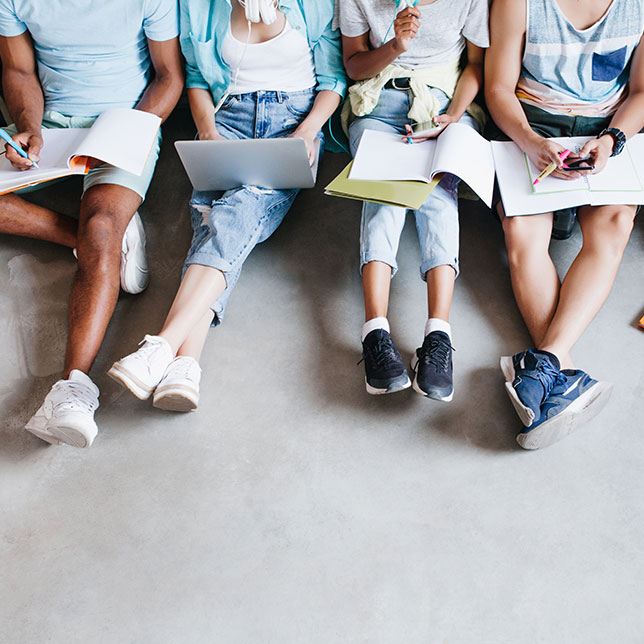 Students Sitting in the Hallway