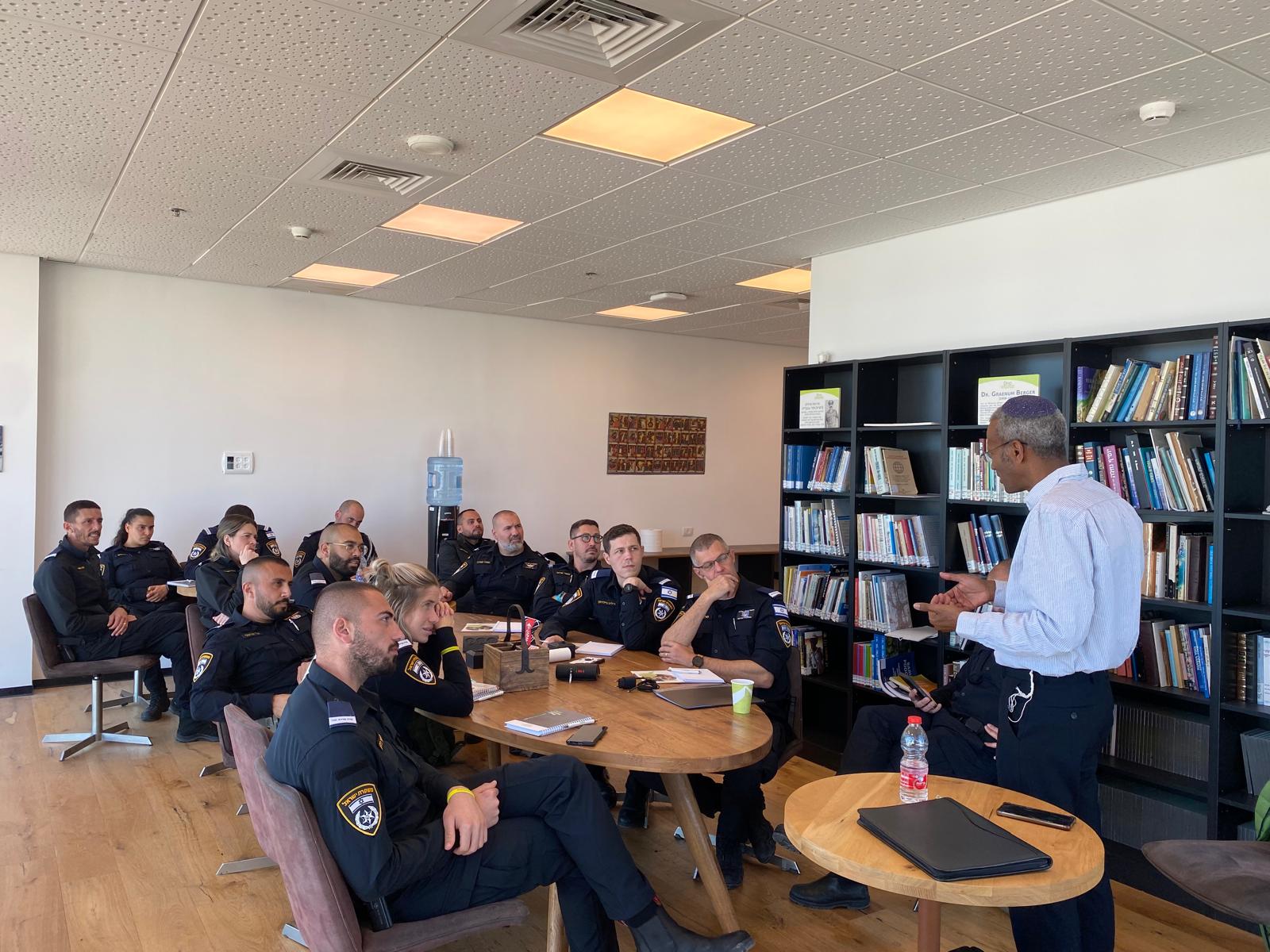 Rabbi Dr. Sharon Shalom addresses police delegation