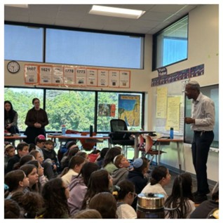 Rabbi Dr. Sharon Shalom speaks to students at the SAR school in Riverdale New York